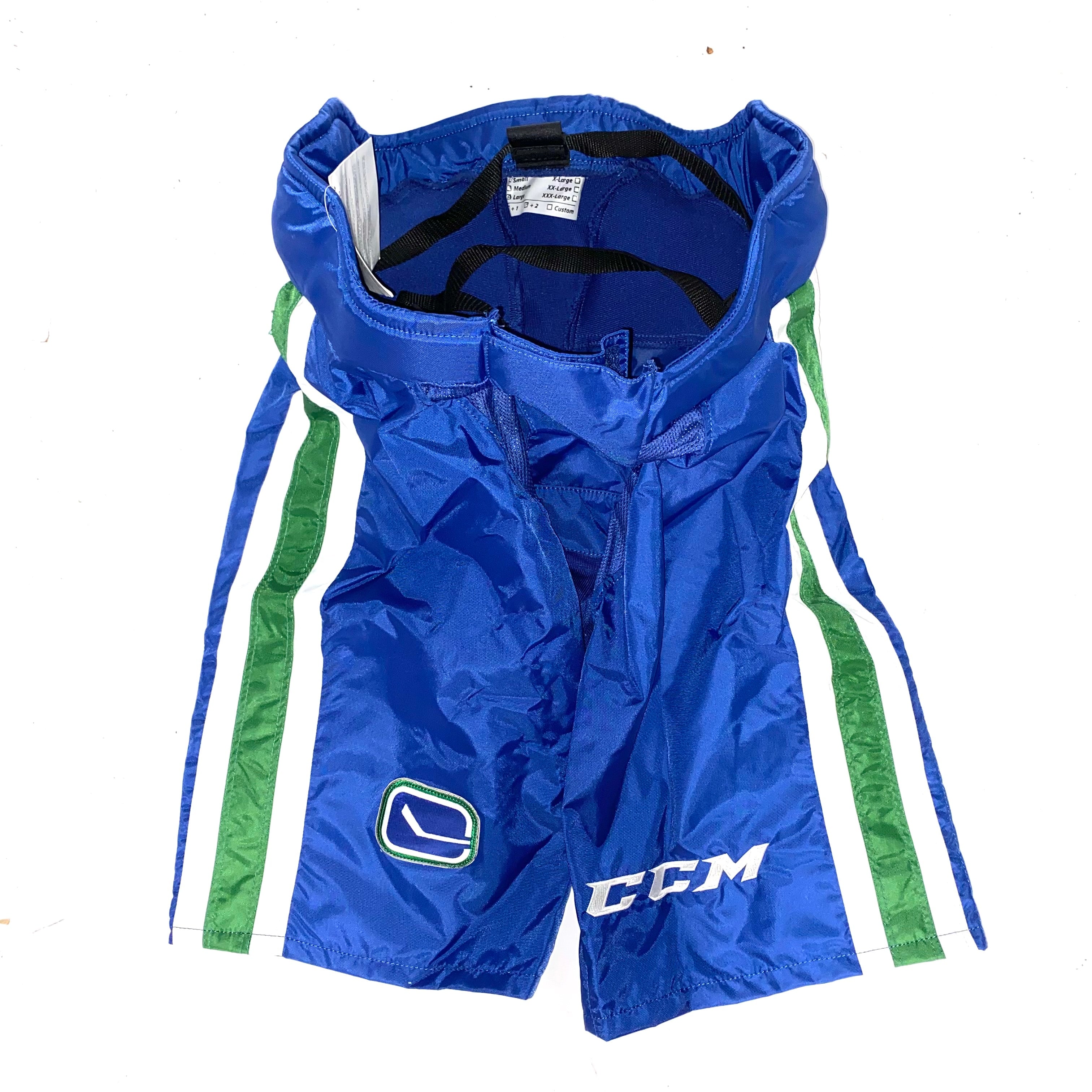 CCM PP90 - Pantalon de protection NHL Pro Stock neuf - Canucks de Vancouver (bleu/vert/blanc)